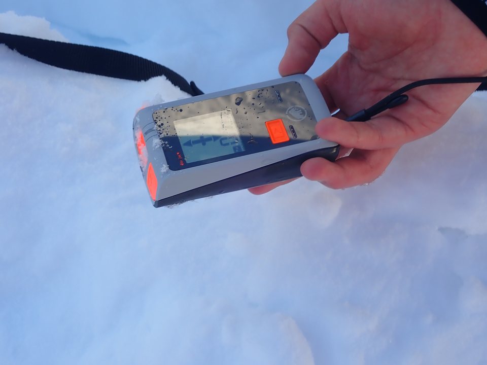 Practicing with an avalanche transceiver in the field